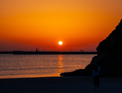 Sunset view over the sea from Enishiya Izumo Villa, highlighting the serene coastal scenery.